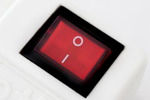 a red neon power switch in the on position