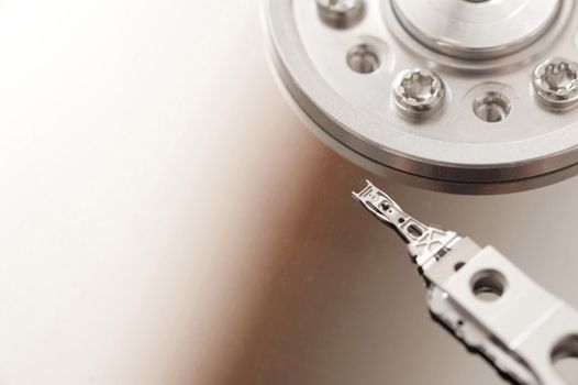 Hard disk drive HDD magnetic head over disk surface full frame close-up detail image with copy space