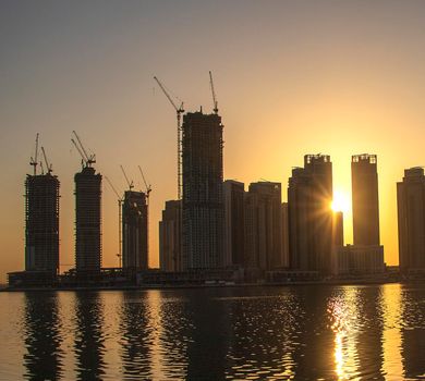 Sunrise in Jadaf area of Dubai, view of Dubai creek Harbor construction of which is partially completed. Outdoors