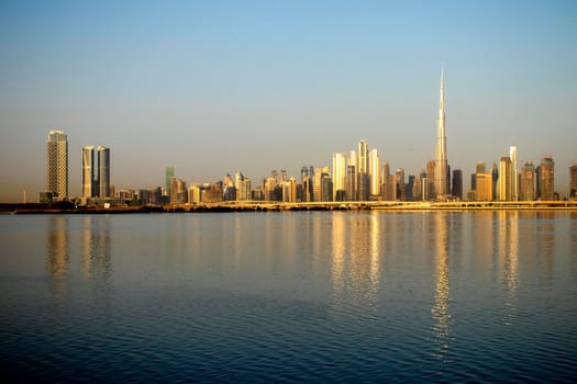 Sunrise over a skyline of a beautiful city of Dubai. Shot made in Jadaf area of the city. UAE. Outdoors