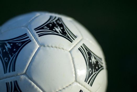 close up on a white leather soccer ball