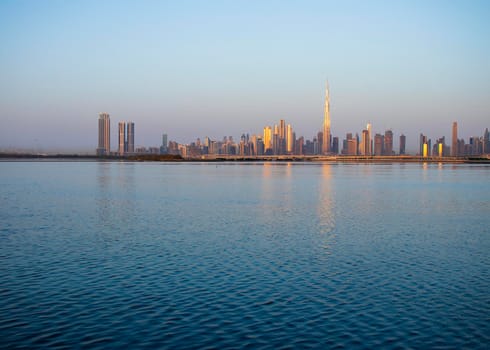 Sunrise over a skyline of a beautiful city of Dubai. Shot made in Jadaf area of the city. UAE. Outdoors