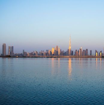 Sunrise over a skyline of a beautiful city of Dubai. Shot made in Jadaf area of the city. UAE. Outdoors