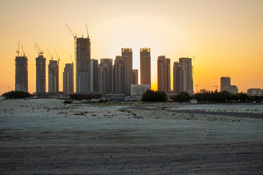 Sunrise in Jadaf area of Dubai, view of Dubai creek Harbor construction of which is partially completed. Outdoors