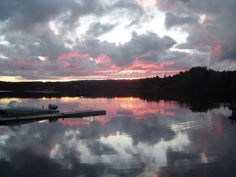 sunset over a lake in Algonquin provincial park, Ontario, Canada