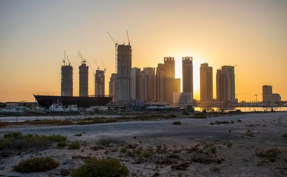 Sunrise in Jadaf area of Dubai, view of Dubai creek Harbor construction of which is partially completed. Outdoors