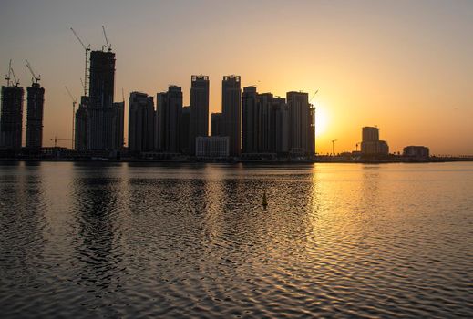 Sunrise in Jadaf area of Dubai, view of Dubai creek Harbor construction of which is partially completed. Outdoors