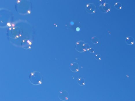 carefree - bubbles floating in the sky, light and free as the wind