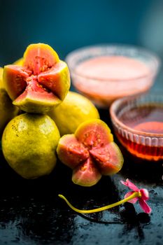 Skin whitening remedy/treatment on the black shiny surface consisting of guava pulp and honey. Also used in the spa as a face mask.