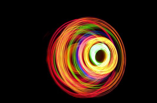 an image of circular light painting patterns