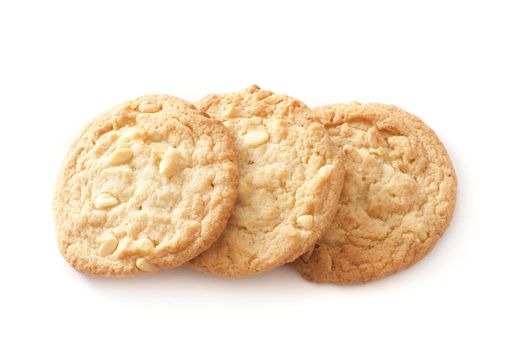 Three golden fresh crunchy nut cookies arranged in an overlapping line on a white background