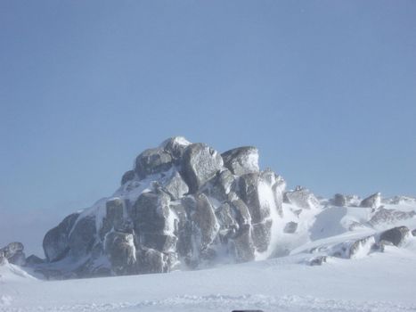 bad weather: snow blowing in the wind