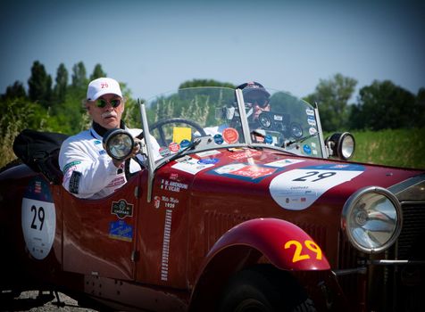 URBINO - ITALY - JUN 16 - 2022 : ALFA ROMEO 6C 1500 SS MM 1928 on an old racing car in rally Mille Miglia 2022 the famous italian historical race (1927-1957