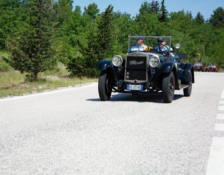 URBINO - ITALY - JUN 16 - 2022 : FIAT 520 1929 on an old racing car in rally Mille Miglia 2022 the famous italian historical race (1927-1957