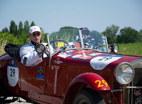 URBINO - ITALY - JUN 16 - 2022 : ALFA ROMEO 6C 1500 SS MM 1928 on an old racing car in rally Mille Miglia 2022 the famous italian historical race (1927-1957