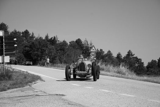 URBINO - ITALY - JUN 16 - 2022 : BUGATTI T35 1925 on an old racing car in rally Mille Miglia 2022 the famous italian historical race (1927-1957