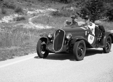 URBINO - ITALY - JUN 16 - 2022 : FIAT 508 S BALILLA COPPA D ORO 1934 on an old racing car in rally Mille Miglia 2022 the famous italian historical race (1927-1957