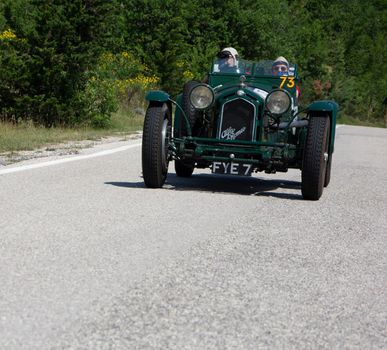 URBINO - ITALY - JUN 16 - 2022 : ALFA ROMEO 8C 2300 MONZA 1933 on an old racing car in rally Mille Miglia 2022 the famous italian historical race (1927-1957