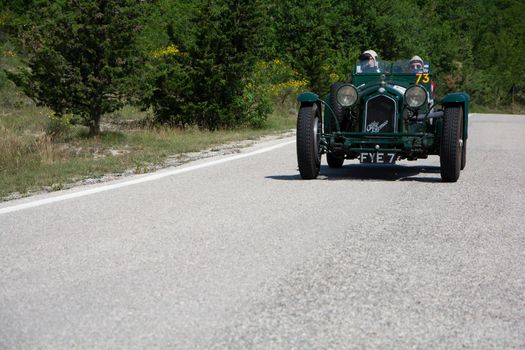 URBINO - ITALY - JUN 16 - 2022 : ALFA ROMEO 8C 2300 MONZA 1933 on an old racing car in rally Mille Miglia 2022 the famous italian historical race (1927-1957