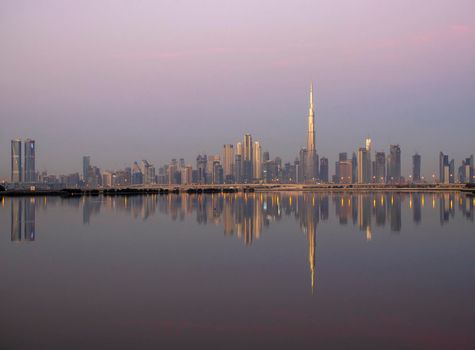 Dubai, UAE - 01.29.2021 Sunrise over Dubai city skyline.