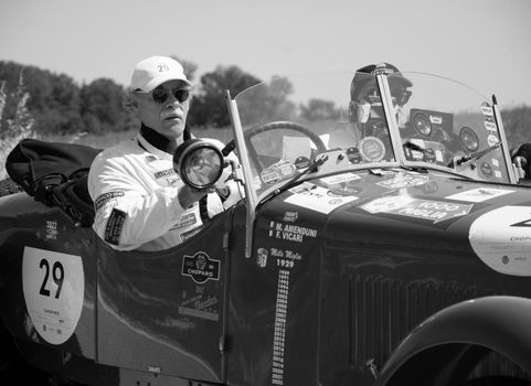 URBINO - ITALY - JUN 16 - 2022 : ALFA ROMEO 6C 1500 SS MM 1928 on an old racing car in rally Mille Miglia 2022 the famous italian historical race (1927-1957