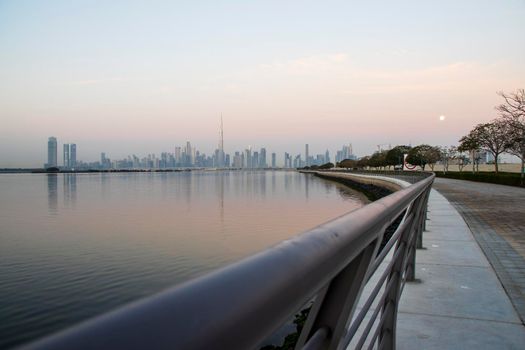 Dubai, UAE - 01.29.2021 Sunrise over Dubai city skyline.