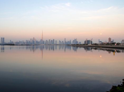 Dubai, UAE - 01.29.2021 Sunrise over Dubai city skyline.