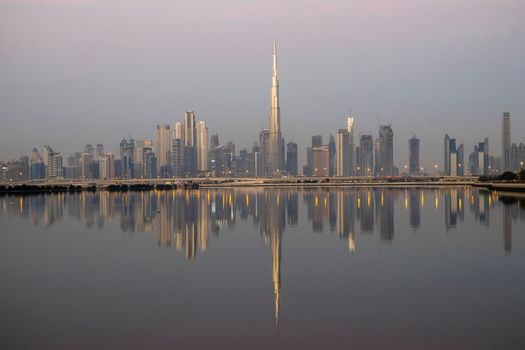 Dubai, UAE - 01.29.2021 Sunrise over Dubai city skyline.