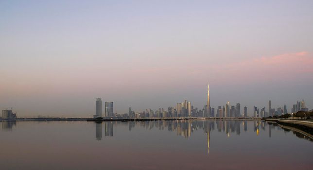 Dubai, UAE - 01.29.2021 Sunrise over Dubai city skyline.