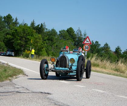 URBINO - ITALY - JUN 16 - 2022 : BUGATTI T35 1925 on an old racing car in rally Mille Miglia 2022 the famous italian historical race (1927-1957