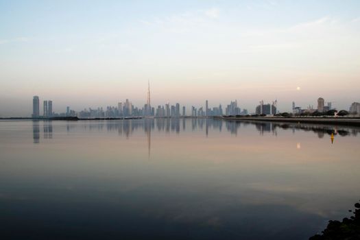 Dubai, UAE - 01.29.2021 Sunrise over Dubai city skyline.