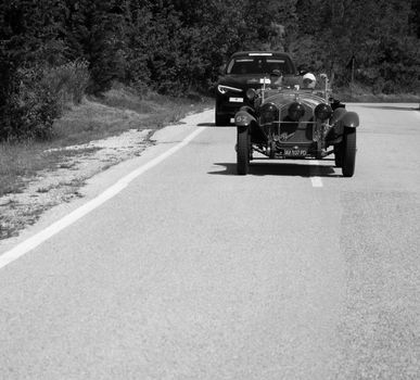 URBINO - ITALY - JUN 16 - 2022 : ALFA ROMEO 6C 1750 SS ZAGATO 1929 on an old racing car in rally Mille Miglia 2022 the famous italian historical race (1927-1957