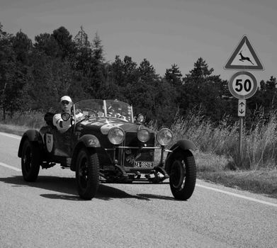 URBINO - ITALY - JUN 16 - 2022 : ALFA ROMEO 6C 1500 SS MM 1928 on an old racing car in rally Mille Miglia 2022 the famous italian historical race (1927-1957