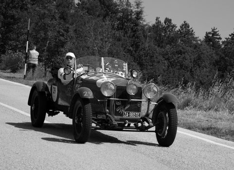 URBINO - ITALY - JUN 16 - 2022 : ALFA ROMEO 6C 1500 SS MM 1928 on an old racing car in rally Mille Miglia 2022 the famous italian historical race (1927-1957