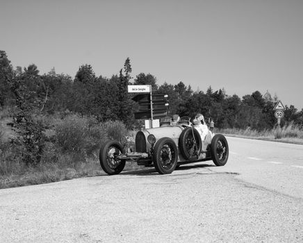 URBINO - ITALY - JUN 16 - 2022 : BUGATTI T35 1925 on an old racing car in rally Mille Miglia 2022 the famous italian historical race (1927-1957