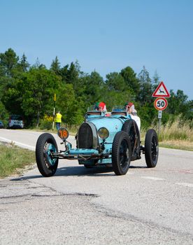 URBINO - ITALY - JUN 16 - 2022 : BUGATTI T35 1925 on an old racing car in rally Mille Miglia 2022 the famous italian historical race (1927-1957