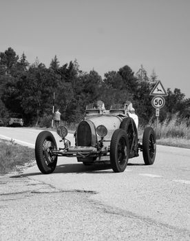 URBINO - ITALY - JUN 16 - 2022 : BUGATTI T35 1925 on an old racing car in rally Mille Miglia 2022 the famous italian historical race (1927-1957