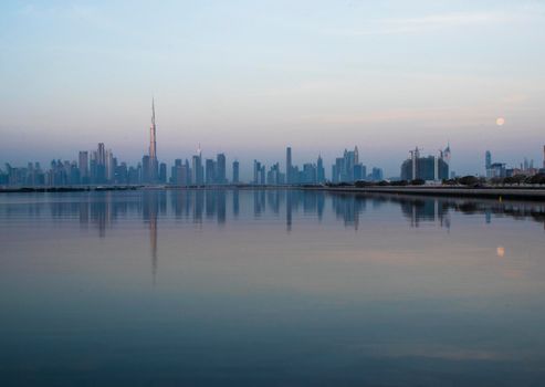 Dubai, UAE - 01.29.2021 Sunrise over Dubai city skyline.