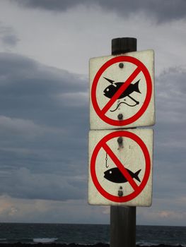 signs prohibiting spear and line fishing