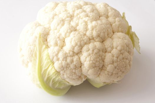 Whole white cauliflower on white background. Isolated
