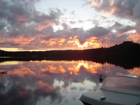 sunset over a lake in Algonquin provincial park, Ontario, Canada