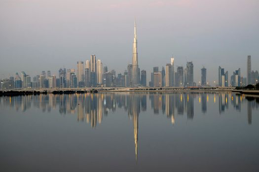 Dubai, UAE - 01.29.2021 Sunrise over Dubai city skyline.