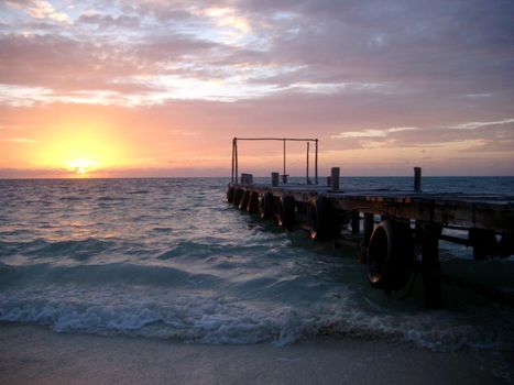 sun rising over the caribbean sea, punta allen, mexico.