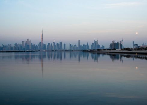 Dubai, UAE - 01.29.2021 Sunrise over Dubai city skyline.