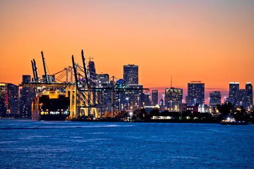 Port of Miami docks and cranes dusk view, Florida state, USA