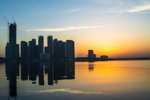 Dubai, UAE - 01.29.202 Sunrise over Dubai city skyline. Creek Harbor by EMAAR