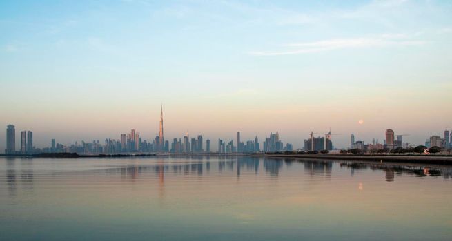 Dubai, UAE - 01.29.2021 Sunrise over Dubai city skyline.