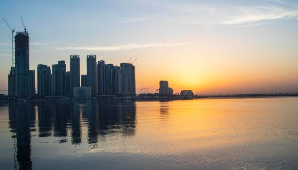 Dubai, UAE - 01.29.2021 Sunrise over Dubai city skyline. Creek Harbor by EMAAR