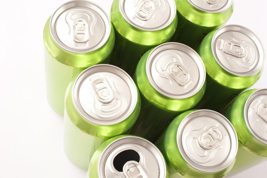 Nine grouped green cans of energy drink viewed from above with eight closed tabs and one that has been pulled and opened