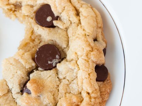 Broken homemade chocolate chip cookies.